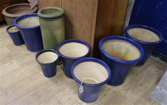 Seven dark blue glazed garden planters, an earthenware planter and a terracotta chimney pot (9)